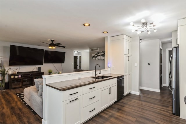 kitchen with stainless steel refrigerator, kitchen peninsula, white cabinets, dark wood-type flooring, and dishwasher