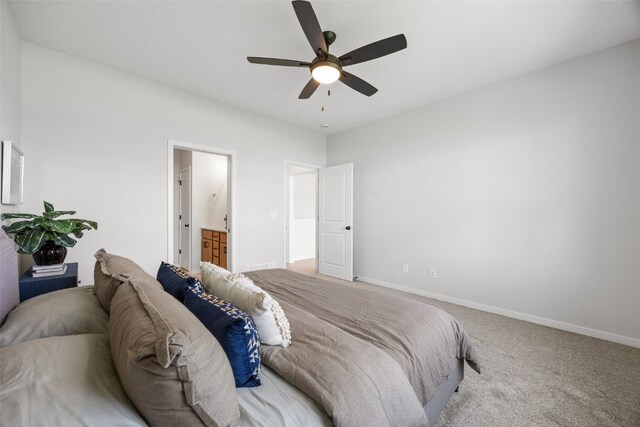 1930 Bowstring Dr, Marion, IA 52302 - carpeted bedroom featuring ceiling fan and connected bathroom