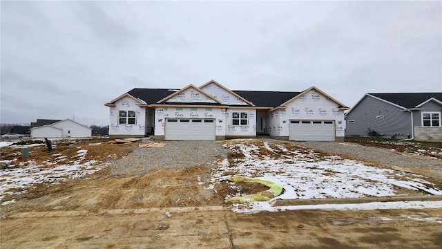 property in mid-construction with a garage