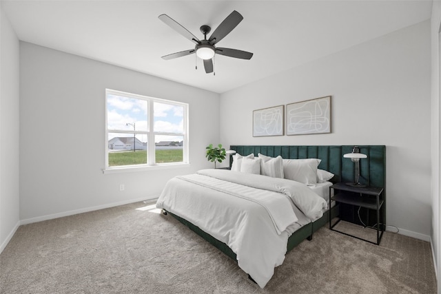 1932 Bowstring Dr, Marion, IA 52302 - bedroom featuring carpet, baseboards, and ceiling fan