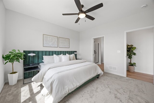 1932 Bowstring Dr, Marion, IA 52302 - bedroom with carpet, baseboards, and ceiling fan