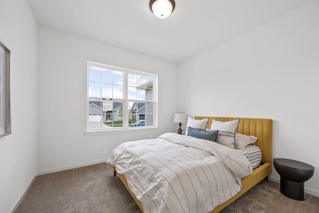 1932 Bowstring Dr, Marion, IA 52302 - carpeted bedroom featuring baseboards