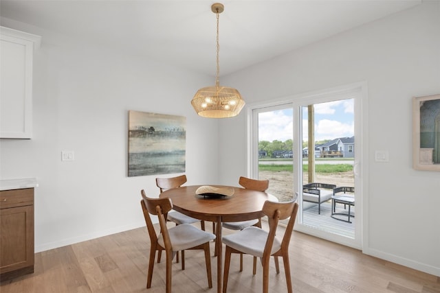 1932 Bowstring Dr, Marion, IA 52302 - dining room featuring light wood finished floors, a chandelier, and baseboards