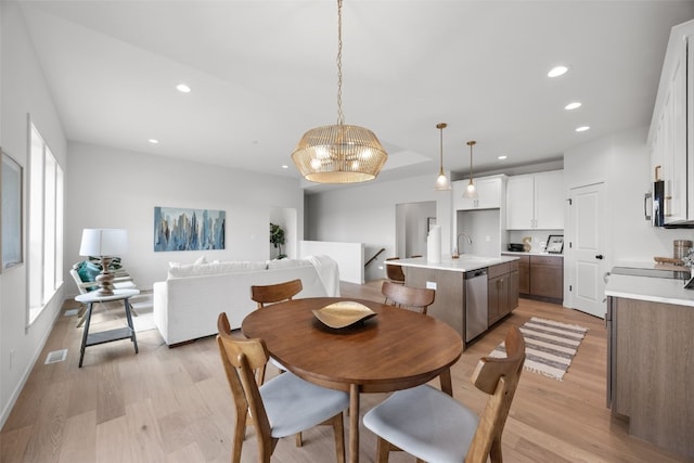 1932 Bowstring Dr, Marion, IA 52302 - dining room with light wood finished floors, recessed lighting, and a chandelier