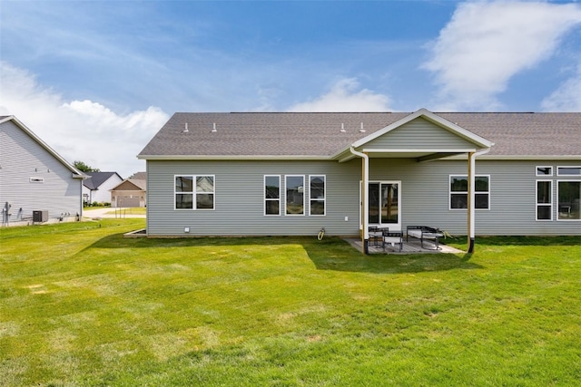 1932 Bowstring Dr, Marion, IA 52302 - rear view of property featuring a patio, a lawn, and a shingled roof