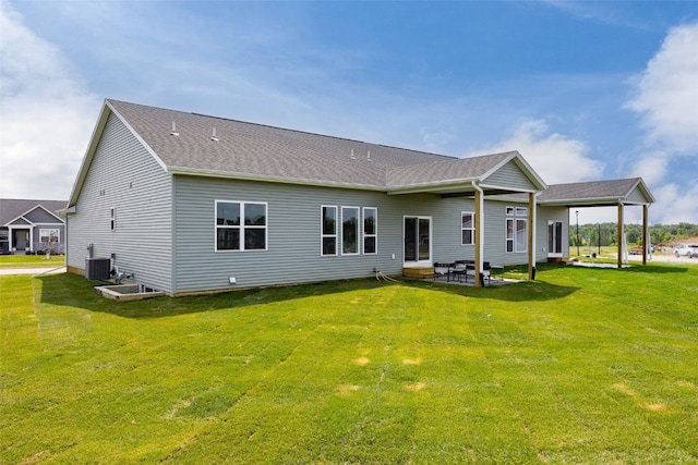 1932 Bowstring Dr, Marion, IA 52302 - rear view of property featuring a lawn and a patio