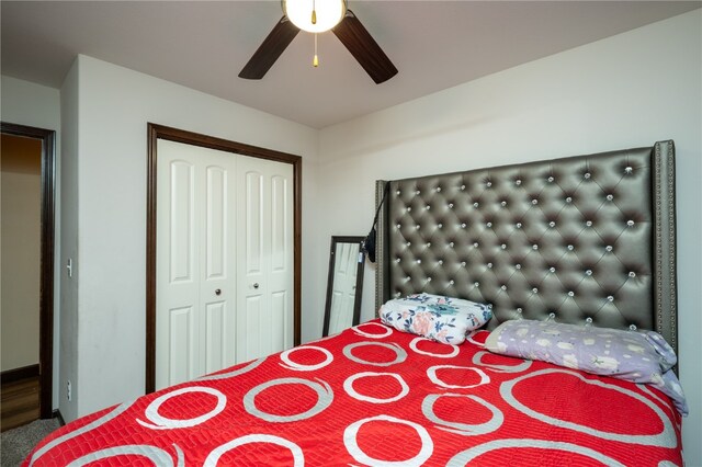 bedroom featuring ceiling fan and a closet