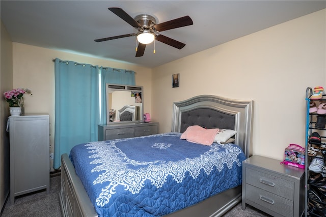 carpeted bedroom featuring ceiling fan