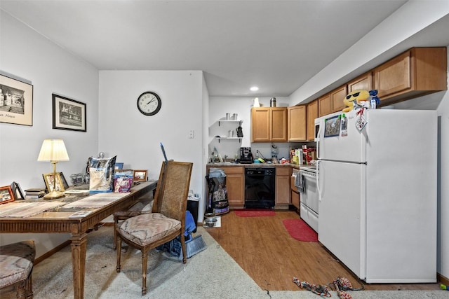 kitchen with white appliances and light wood-type flooring