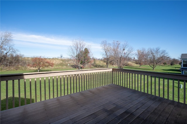 deck featuring a yard