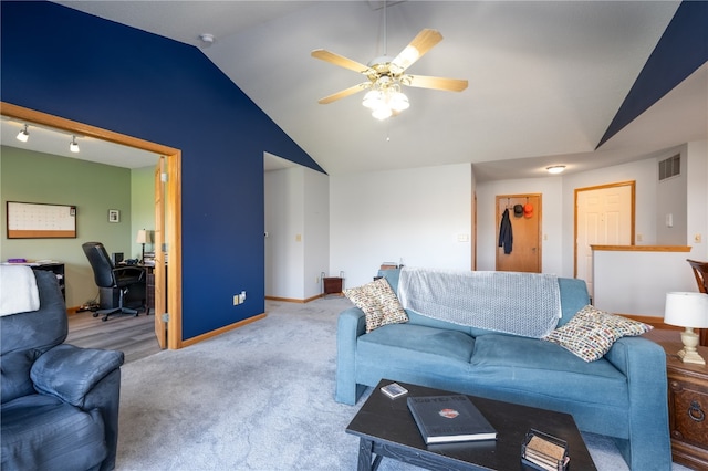 living room featuring lofted ceiling, light carpet, and ceiling fan