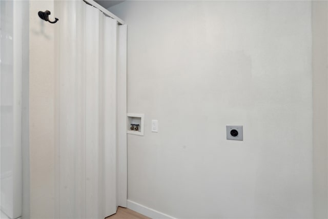 laundry area with hookup for an electric dryer and hookup for a washing machine