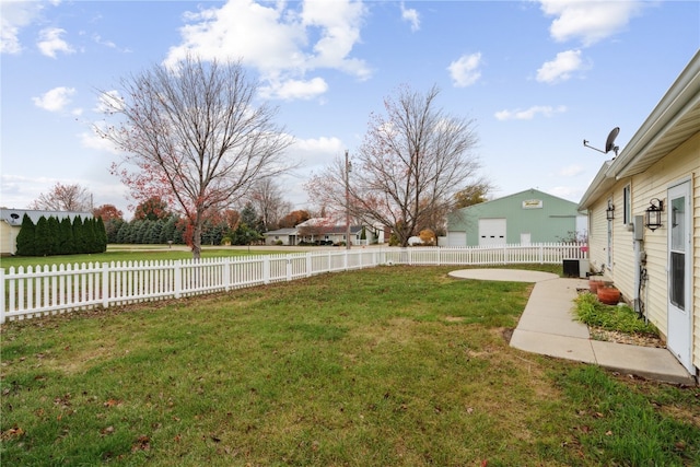 view of yard featuring an outbuilding and central air condition unit