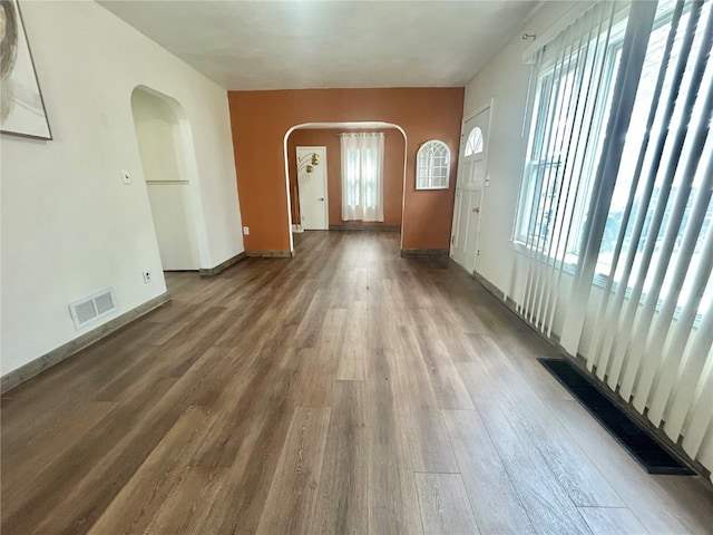 empty room featuring dark hardwood / wood-style floors