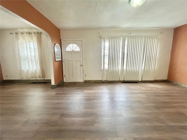 entryway with hardwood / wood-style flooring