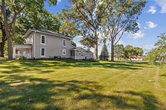 view of yard with a porch