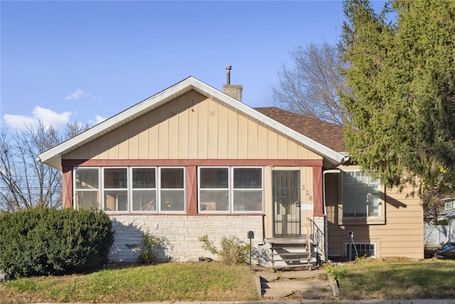 bungalow featuring a sunroom