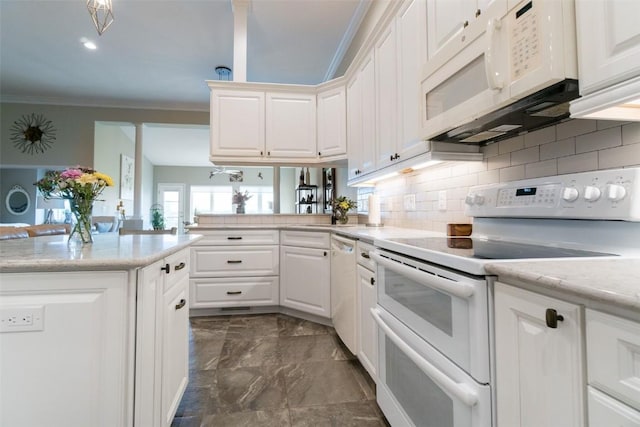 kitchen featuring white cabinets, white appliances, and kitchen peninsula