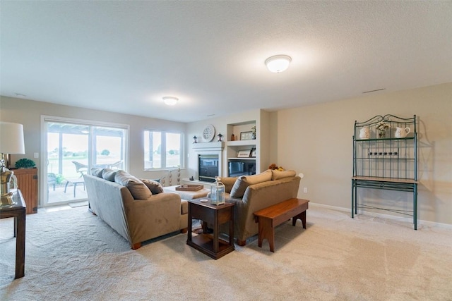 carpeted living room with built in shelves