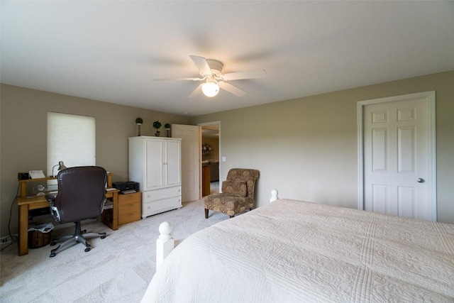 bedroom featuring light colored carpet and ceiling fan