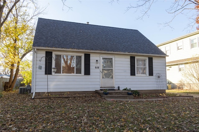 bungalow-style home featuring central AC unit