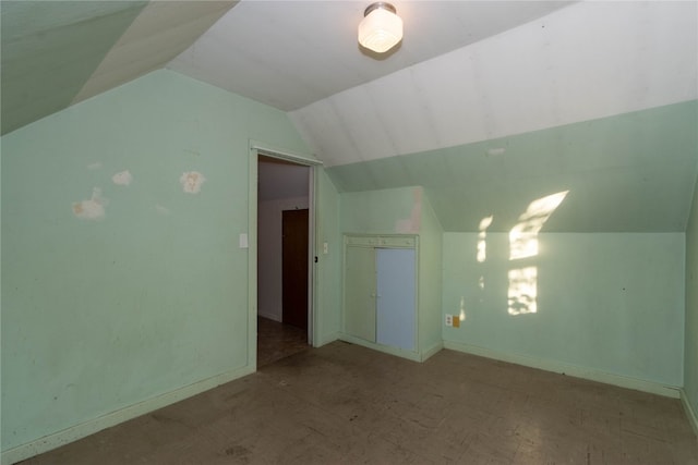 bonus room featuring lofted ceiling