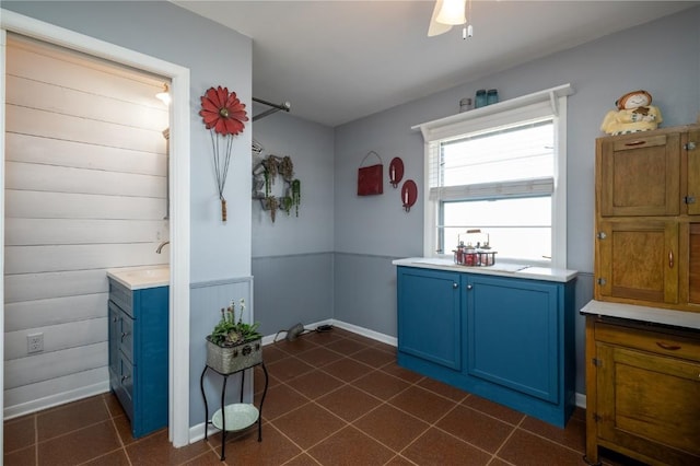 2482 65th St, Vinton, IA 52349 - bathroom featuring vanity, tile patterned flooring, and ceiling fan