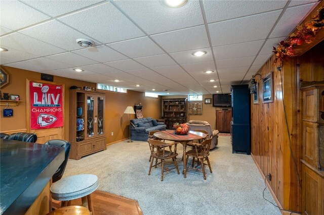 2482 65th St, Vinton, IA 52349 - dining room featuring light colored carpet and a paneled ceiling