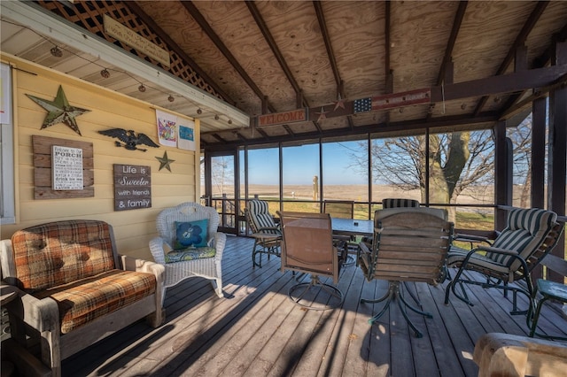 sunroom with lofted ceiling