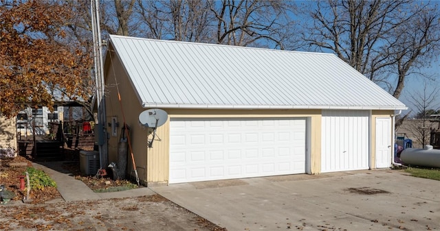 2482 65th St, Vinton, IA 52349 - detached garage with central AC unit