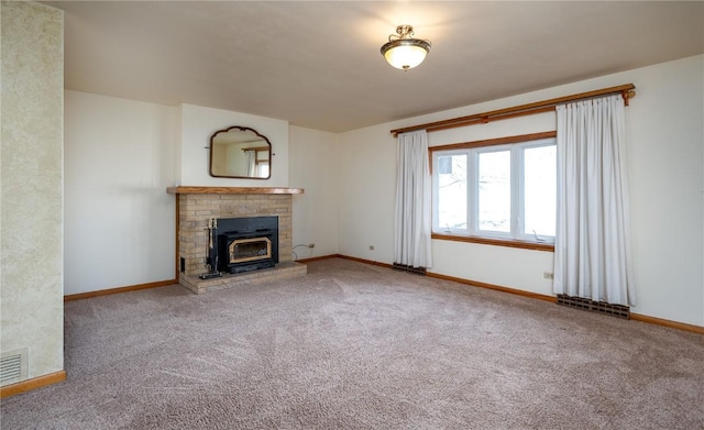 2482 65th St, Vinton, IA 52349 - unfurnished living room featuring carpet and baseboards