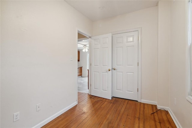 unfurnished bedroom featuring hardwood / wood-style floors