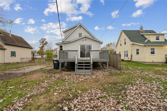 back of property with a deck