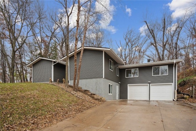 view of side of property featuring a garage