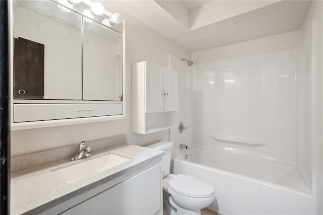 full bathroom featuring toilet, vanity, and washtub / shower combination