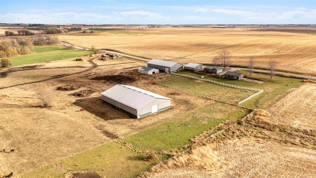 entry to storm shelter with a rural view