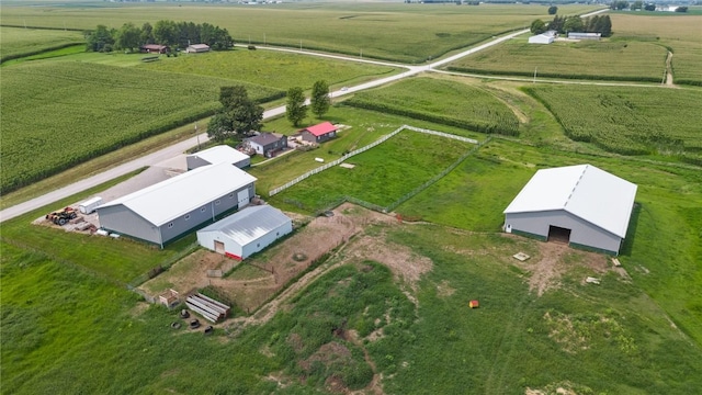 birds eye view of property featuring a rural view