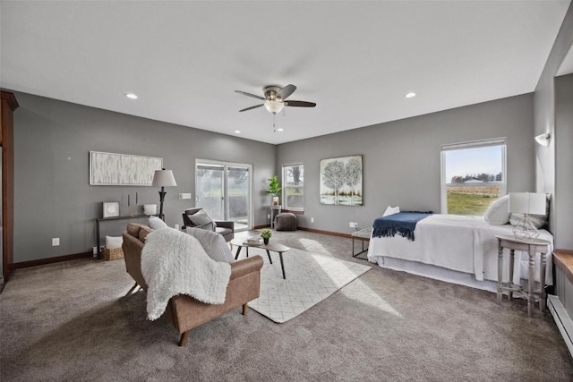 bedroom featuring ceiling fan, multiple windows, access to exterior, and carpet