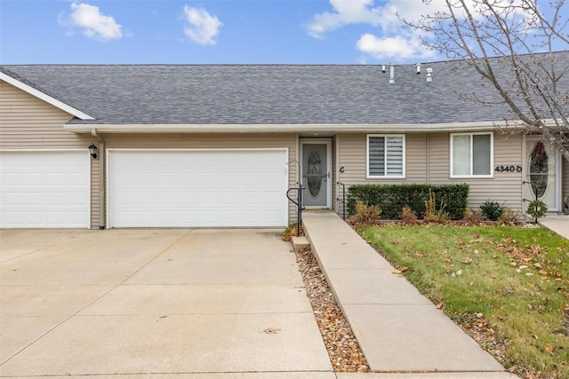 single story home with a garage