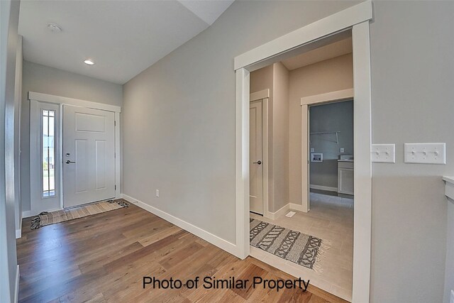 foyer featuring hardwood / wood-style floors