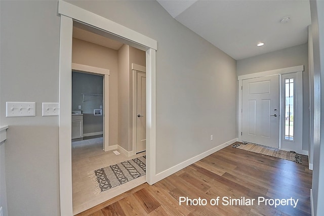 entrance foyer featuring hardwood / wood-style floors