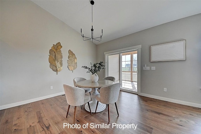 2933 Clubhouse Dr, Marion, IA 52302 - dining area with wood finished floors and a chandelier