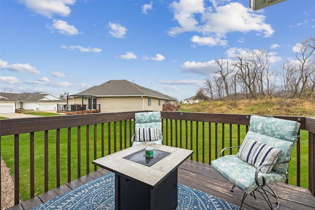 wooden deck with a yard