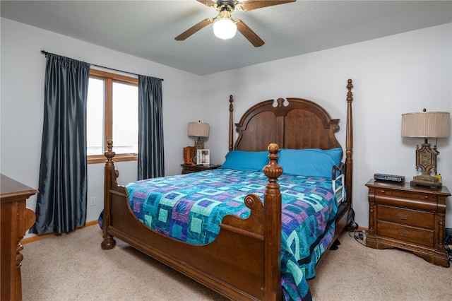 bedroom featuring ceiling fan and carpet floors