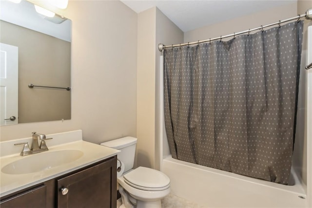 full bathroom with vanity, toilet, and shower / bath combo with shower curtain