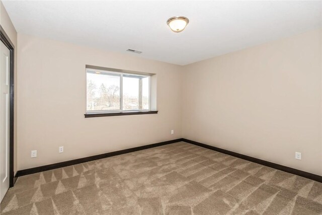 view of carpeted spare room