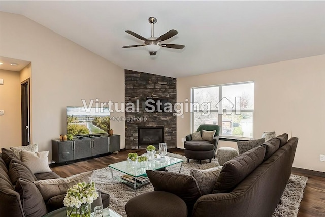 living room with lofted ceiling, a fireplace, dark hardwood / wood-style flooring, and ceiling fan