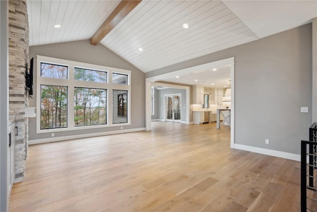 3037 Dell Ridge Ct, Hiawatha, IA 52233 - unfurnished living room featuring light wood-style floors, baseboards, a fireplace, and wood ceiling