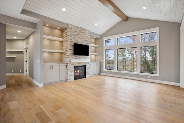 3037 Dell Ridge Ct, Hiawatha, IA 52233 - unfurnished living room with light wood-style floors, a stone fireplace, baseboards, built in shelves, and recessed lighting