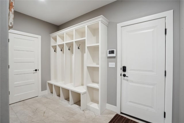 3037 Dell Ridge Ct, Hiawatha, IA 52233 - mudroom featuring light marble finish flooring and baseboards